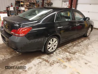 2008 Toyota Avalon XL with VIN 4T1BK36B98U286881, listed as a IAAI auction lot 41873012 with 176,054 mi miles. Bid and sale history available at carsss.com. Image 4.