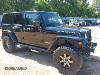 2016 Jeep Wrangler Unlimited Rubicon Hard Rock z VIN 1C4BJWFG0GL218364, wystawiony jako IAAI lot #42310664 z przebiegiem 112 379 mil mil oraz . Historia ofert i sprzedaży dostępna na DreamBid. Obrazek 1.
