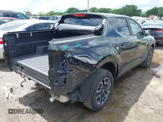 2022 Hyundai Santa Cruz SEL with VIN 5NTJBDAE2NH008015, listed as a IAAI auction lot 42232891 with 31,450 mi miles and . Bid and sale history available at DreamBid. Image 4.