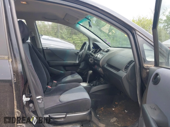 2007 Honda Fit with VIN JHMGD38437S014676, listed as a IAAI auction lot 42698451 with 288,354 mi miles and . Bid and sale history available at DreamBid. Image 5.