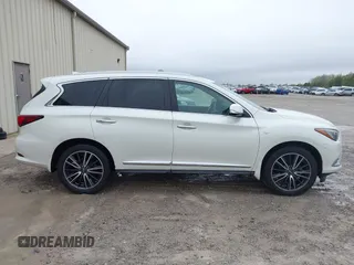 2016 Infiniti QX60 with VIN 5N1AL0MN9GC514600, listed as a IAAI auction lot 41931246 with 197,232 mi miles and . Bid and sale history available at DreamBid. Image 13.