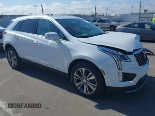2025 Cadillac XT5 FWD Premium Luxury with VIN 1GYKNCRS2SZ133237, listed as a IAAI auction lot 42437581 with 893 mi miles and . Bid and sale history available at DreamBid. Image 1.