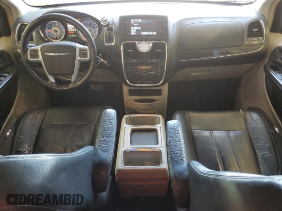 2014 Chrysler Town & Country Touring with VIN 2C4RC1BG1ER157788, listed as a Copart auction lot 67505954 with 217,541 mi miles and Salvage Title. Bid and sale history available at DreamBid. Image 8.