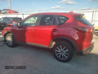 2015 Mazda CX-5 Touring with VIN JM3KE4CY8F0484177, listed as a Copart auction lot 51303395 with 113,307 mi miles and Non Repairable. Bid and sale history available at DreamBid. Image 2.