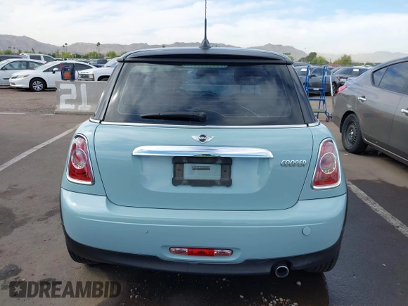 2012 MINI Hardtop z VIN WMWSU3C5XCT543913, wystawiony jako IAAI lot #42344874 z przebiegiem 108 245 mil mil oraz . Historia ofert i sprzedaży dostępna na DreamBid. Obrazek 17.
