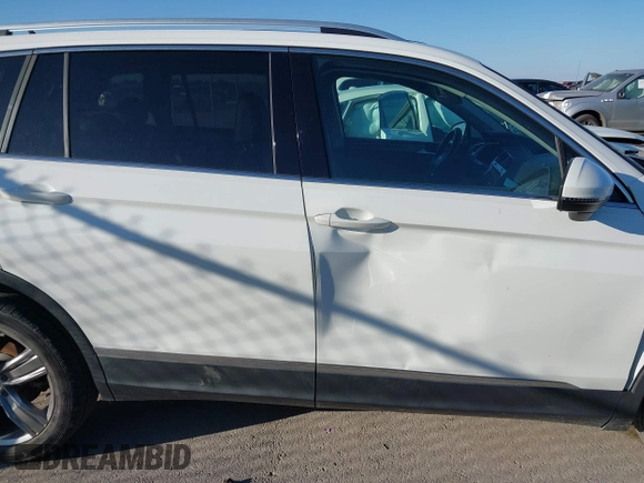 2018 Volkswagen Tiguan SEL Premium with VIN 3VV5B7AX2JM202908, listed as a IAAI auction lot 41137619 with 84,323 mi miles and . Bid and sale history available at DreamBid. Image 13.