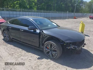 2016 Audi A7 Premium Plus with VIN WAUWGAFC1GN140887, listed as a IAAI auction lot 42067184 with 157,855 mi miles and . Bid and sale history available at DreamBid. Image 1.