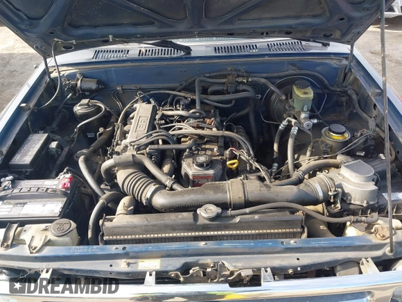 1994 Toyota 2WD Pickups DX with VIN JT4RN93P5R5103730, listed as a IAAI auction lot 42164918 with 396,623 mi miles. Bid and sale history available at carsss.com. Image 10.