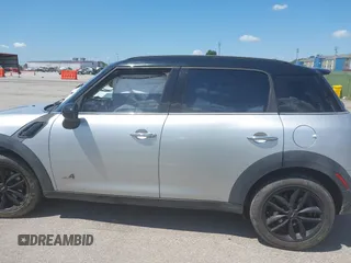 2011 MINI Countryman S with VIN WMWZC5C53BWL53641, listed as a IAAI auction lot 42547084 with 171,647 mi miles and . Bid and sale history available at DreamBid. Image 14.