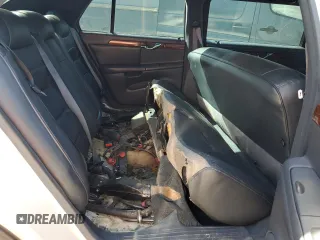 2002 Cadillac DeVille Limousine z VIN 1GEEH90Y72U550842, wystawiony jako Copart lot #52629735 z przebiegiem Nie podano mil oraz Szkoda całkowita • Salvage title. Historia ofert i sprzedaży dostępna na DreamBid. Obrazek 11.