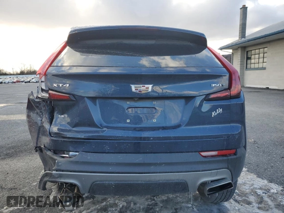 2021 Cadillac XT4 AWD Premium Luxury with VIN 1GYFZDR4XMF007080, listed as a Copart auction lot 87943335 with 36,379 mi miles and Salvage Title. Bid and sale history available at carsss.com. Image 6.