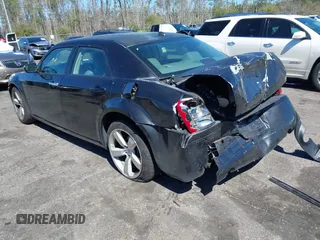 2005 Chrysler 300 with VIN 2C3AA63HX5H649107, listed as a IAAI auction lot 41748562 with 173,803 mi miles. Bid and sale history available at carsss.com. Image 3.