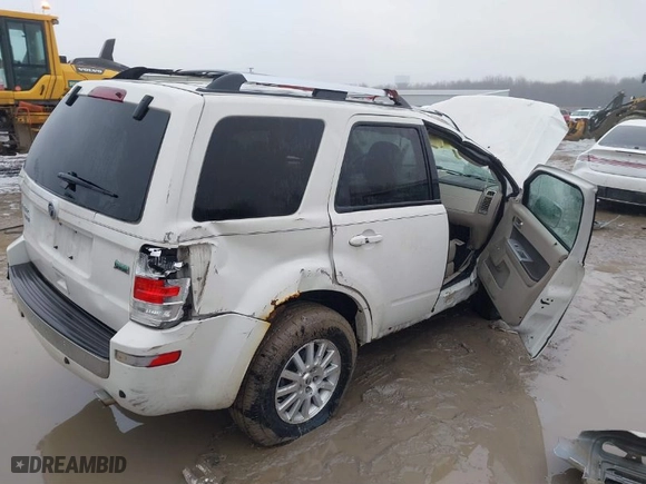 2010 Mercury Mariner Premier with VIN 4M2CN9HG8AKJ09679, listed as a IAAI auction lot 41472049 with 99,554 mi miles. Bid and sale history available at carsss.com. Image 6.