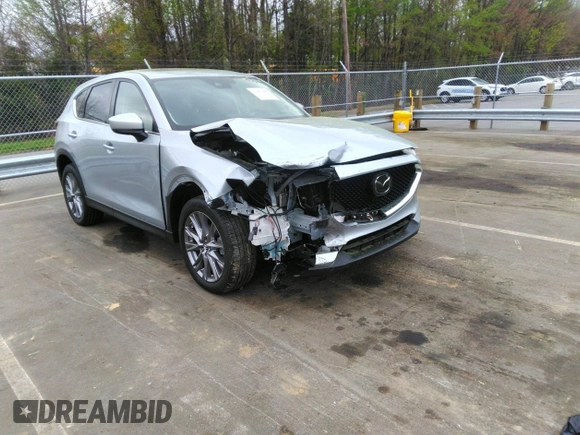 2019 Mazda CX-5 Grand Touring with VIN JM3KFADM2K1631928, listed as a IAAI auction lot 41961695 with 41,190 mi miles. Bid and sale history available at carsss.com. Image 1.