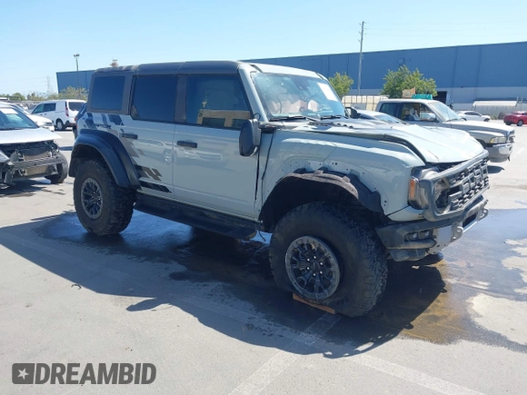 2023 Ford Bronco Raptor with VIN 1FMEE5JR7PLC04106, listed as a IAAI auction lot 42316422 with 6,859 mi miles and . Bid and sale history available at DreamBid. Image 1.