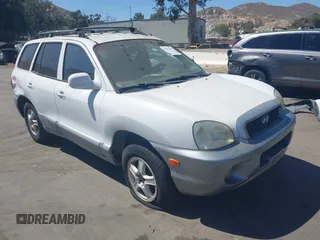 2004 Hyundai Santa Fe GLS z VIN KM8SC73DX4U687375, wystawiony jako IAAI lot #42517500 z przebiegiem 167 868 mil mil oraz . Historia ofert i sprzedaży dostępna na DreamBid. Obrazek 1.