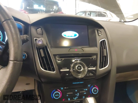2016 Ford Focus Electric with VIN 1FADP3R41GL363586, listed as a IAAI auction lot 41518253 with 36,884 mi miles and . Bid and sale history available at DreamBid. Image 14.