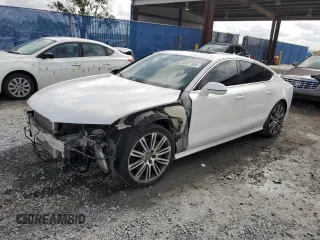 2012 Audi A7 Prestige с VIN WAU2GAFC4CN056443, выставлен на аукционе Copart как лот 60077495 с пробегом 182 818 миль миль и Списание • Salvage title. История ставок и продаж доступна на DreamBid. Изображение 1.