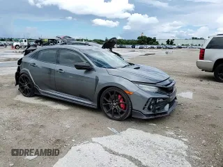 2018 Honda Civic Type R Touring z VIN SHHFK8G73JU203326, wystawiony jako Copart lot #69673394 z przebiegiem 80 339 mil mil oraz Nie do naprawy • Non repairable. Historia ofert i sprzedaży dostępna na DreamBid. Obrazek 11.