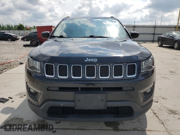 2017 Jeep Compass Latitude with VIN 3C4NJCBB0HT611440, listed as a Copart auction lot 57401485 with 128,319 mi miles and Salvage title. Bid and sale history available at DreamBid. Image 5.