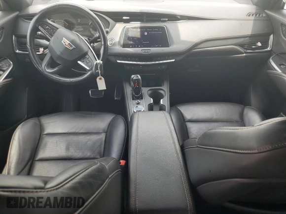 2020 Cadillac XT4 FWD Sport with VIN 1GYFZER49LF123830, listed as a Copart auction lot 55737985 with 98,871 mi miles and Salvage title. Bid and sale history available at DreamBid. Image 8.
