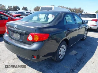 2009 Toyota Corolla with VIN JTDBL40E199094885, listed as a IAAI auction lot 41840789 with 106,498 mi miles. Bid and sale history available at carsss.com. Image 4.