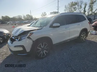 2019 Honda Pilot Touring 7-Passenger z VIN 5FNYF5H65KB039145, wystawiony jako Copart lot #48509705 z przebiegiem 129 327 mil mil oraz Szkoda całkowita • Salvage title. Historia ofert i sprzedaży dostępna na DreamBid. Obrazek 1.