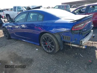 2020 Dodge Charger Scat Pack z VIN 2C3CDXGJ4LH157432, wystawiony jako IAAI lot #41872478 z przebiegiem 65 640 mil mil oraz . Historia ofert i sprzedaży dostępna na DreamBid. Obrazek 3.