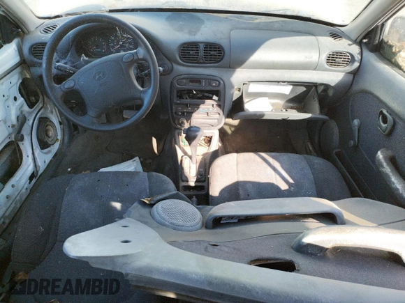 1997 Hyundai Accent z VIN KMHVF24NXVU373676, wystawiony jako Copart lot #77866484 z przebiegiem 151 949 mil mil oraz Tytuł czysty. Historia ofert i sprzedaży dostępna na DreamBid. Obrazek 8.