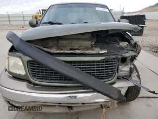 2000 Ford Expedition Eddie Bauer с VIN 1FMRU17L8YLA73107, выставлен на аукционе Copart как лот 44143455 с пробегом 232 826 миль миль и Списание • Salvage title. История ставок и продаж доступна на DreamBid. Изображение 12.