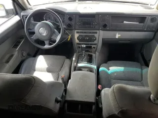 2007 Jeep Commander Sport z VIN 1J8HG48K97C505712, wystawiony jako Copart lot #72011114 z przebiegiem 146 981 mil mil oraz Szkoda całkowita • Salvage title. Historia ofert i sprzedaży dostępna na DreamBid. Obrazek 8.