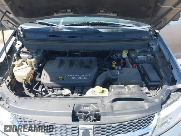 2016 Dodge Journey SE with VIN 3C4PDCAB1GT230387, listed as a IAAI auction lot 42106842 with 157,299 mi miles. Bid and sale history available at carsss.com. Image 10.