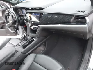 2021 Cadillac XT6 Premium Luxury z VIN 1GYKPCRSXMZ169206, wystawiony jako IAAI lot #41581841 z przebiegiem 64 789 mil mil oraz . Historia ofert i sprzedaży dostępna na DreamBid. Obrazek 5.
