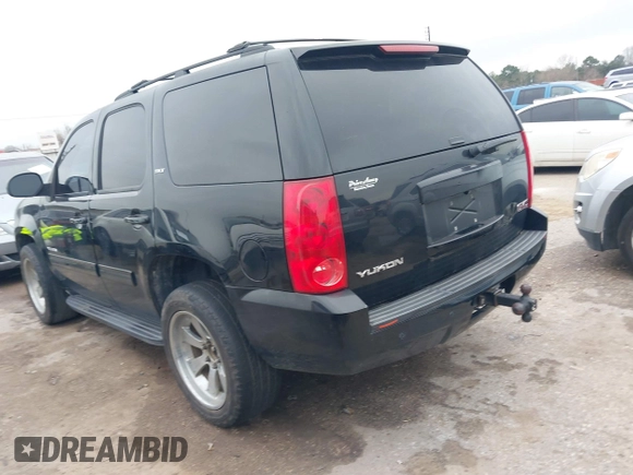 2014 GMC Yukon SLT with VIN 1GKS1CE02ER207447, listed as a IAAI auction lot 41604134 with 199,417 mi miles. Bid and sale history available at carsss.com. Image 3.