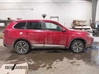 2020 Mitsubishi Outlander ES z VIN JA4AZ3A32LZ020555, wystawiony jako IAAI lot #41549716 z przebiegiem 116 678 mil mil oraz . Historia ofert i sprzedaży dostępna na DreamBid. Obrazek 13.