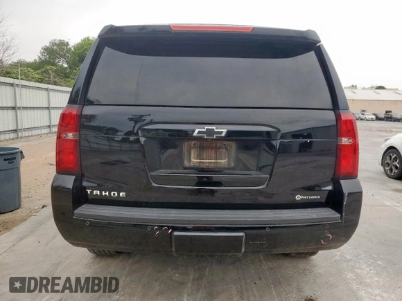 2020 Chevrolet Tahoe LT with VIN 1GNSCBKC5LR203301, listed as a Copart auction lot 57071315 with 106,376 mi miles and Salvage title. Bid and sale history available at DreamBid. Image 6.