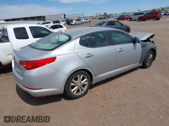 2012 Kia Optima LX with VIN 5XXGM4A7XCG063387, listed as a IAAI auction lot 42087129 with 180,585 mi miles and . Bid and sale history available at carsss.com. Image 4.