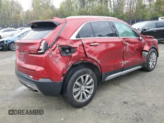 2021 Cadillac XT4 FWD Premium Luxury with VIN 1GYFZCR40MF011603, listed as a Copart auction lot 53068825 with 84,919 mi miles and Salvage title. Bid and sale history available at DreamBid. Image 3.