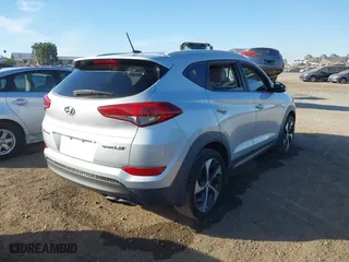 2016 Hyundai Tucson Sport with VIN KM8J33A20GU152145, listed as a IAAI auction lot 41250885 with 117,841 mi miles. Bid and sale history available at carsss.com. Image 4.