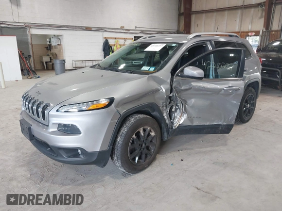 2016 Jeep Cherokee Latitude z VIN 1C4PJMCB9GW148882, wystawiony jako IAAI lot #42210237 z przebiegiem 124 441 mil mil oraz . Historia ofert i sprzedaży dostępna na DreamBid. Obrazek 19.
