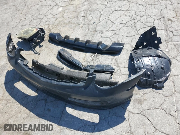 2004 Infiniti G35 w/Leather z VIN JNKCV54E74M811163, wystawiony jako Copart lot #51429105 z przebiegiem 189 079 mil mil oraz Szkoda całkowita • Salvage title. Historia ofert i sprzedaży dostępna na DreamBid. Obrazek 12.