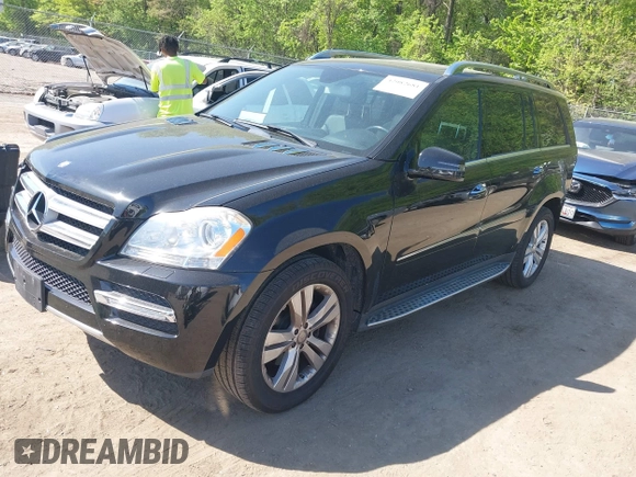 2012 Mercedes-Benz GL-Class GL 450 with VIN 4JGBF7BEXCA790393, listed as a IAAI auction lot 42082681 with 143,095 mi miles. Bid and sale history available at carsss.com. Image 20.