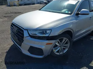 2016 Audi Q3 Premium Plus with VIN WA1EFCFS1GR016996, listed as a IAAI auction lot 41942380 with 90,852 mi miles and . Bid and sale history available at DreamBid. Image 6.