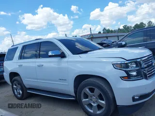 2020 Chevrolet Tahoe LTZ with VIN 1GNSCCKCXLR215899, listed as a IAAI auction lot 40128171 with 109,541 mi miles and . Bid and sale history available at DreamBid. Image 13.