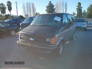 1991 Chevrolet Astro with VIN 1GNDM19Z2MB123653, listed as a IAAI auction lot 41388286 with 175,009 mi miles. Bid and sale history available at carsss.com. Image 6.