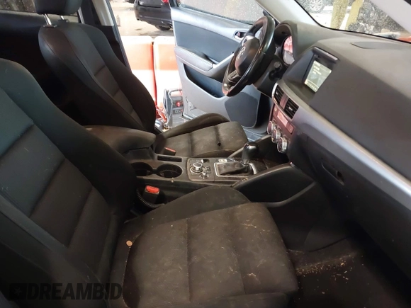2016 Mazda CX-5 Touring with VIN JM3KE2CY7G0867355, listed as a IAAI auction lot 41963169 with 117,727 mi miles and . Bid and sale history available at DreamBid. Image 5.