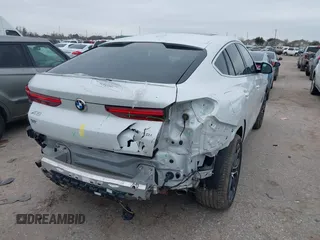 2020 BMW X6 xDrive40i z VIN 5UXCY6C09L9C52142, wystawiony jako IAAI lot #41593337 z przebiegiem 61 892 mil mil oraz . Historia ofert i sprzedaży dostępna na DreamBid. Obrazek 4.