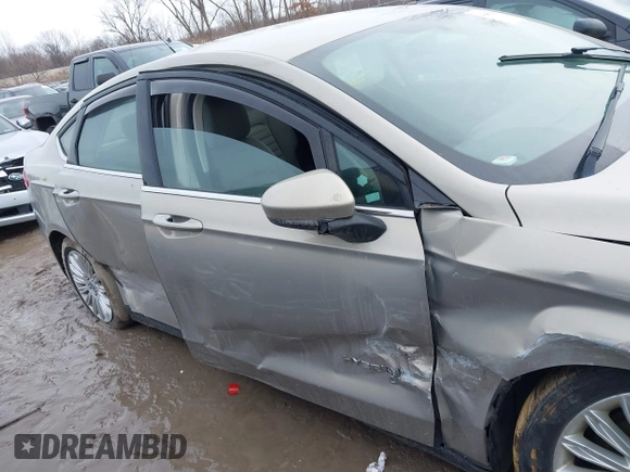 2015 Ford Fusion S Hybrid with VIN 3FA6P0UU4FR111409, listed as a IAAI auction lot 41447316 with 150,068 mi miles. Bid and sale history available at carsss.com. Image 13.