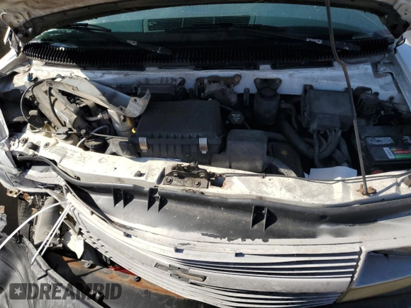 2004 Chevrolet Astro Cargo z VIN 1GCDM19XX4B107207, wystawiony jako Copart lot #74074244 z przebiegiem 207 175 mil mil oraz Szkoda całkowita • Salvage title. Historia ofert i sprzedaży dostępna na DreamBid. Obrazek 12.