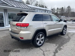 2014 Jeep Grand Cherokee Limited z VIN 1C4RJFBM2EC315721, wystawiony jako IAAI lot #41512041 z przebiegiem 180 972 mil mil oraz . Historia ofert i sprzedaży dostępna na DreamBid. Obrazek 4.